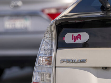Lyft signage on a vehicle as it exits the ride-sharing pickup at San Francisco Internation