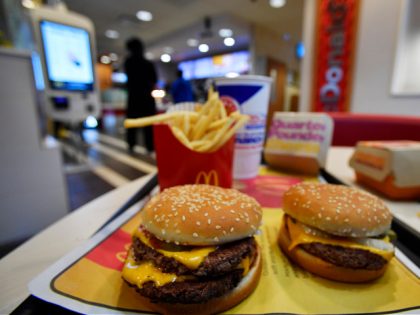 A McDonald's Quarter Pounder, right and a Double Quarter Pound burger is shown with the new fresh beef, Tuesday, March 6, 2018, in Atlanta. McDonald's is offering fresh beef rather than frozen patties in some burgers at thousands of restaurants, a switch it first announced about a year ago as …