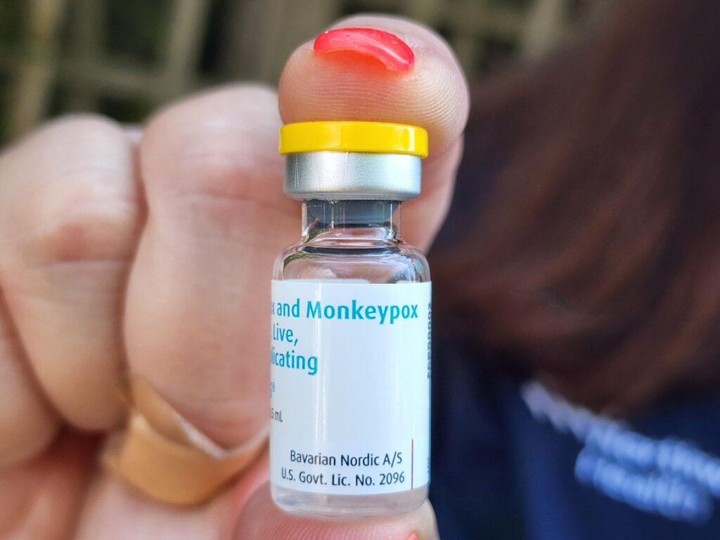 Fire Island, NY: A Northwell Health staff member holds the monkeypox vaccine, at Cherry Grove on Fire Island, New York, where the monkeypox vaccines were administered on July 14, 2022. ( Photo by James Carbone/Newsday RM via Getty Images)