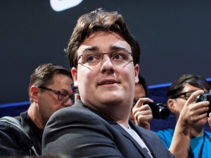 Palmer Luckey, founder and inventor of Oculus VR, demonstrates the Oculus Rift virtual reality headset and the Oculus Touch hand controllers during an event in San Francisco, California on Wednesday, June 11, 2015. (Photo by Ramin Talaie/Corbis via Getty Images)