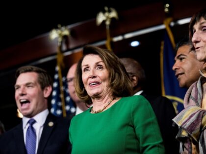 WASHINGTON, DC - Surrounded by Democratic leadership and laughing about a President Donald Trump comment, House Democratic Minority Leaders Nancy Pelosi (D-CA) spoke to journalists after Speaker of the House Paul Ryan concerning the cancelled vote on the American Health Care Act which did not have enough votes for passage …