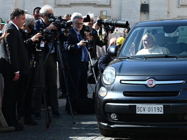 Pope Francis arrives in a car ahead of a canonization mass at St. Peter's Square in The Vatican on May 15, 2022, creating 10 saints including India's Devasahayam, French hermit Charles de Foucauld and Dutch theologian Titus Brandsma. (Photo by Vincenzo PINTO / AFP) (Photo by VINCENZO PINTO/AFP via Getty …