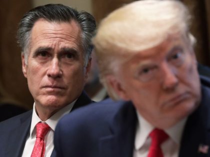 WASHINGTON, DC - NOVEMBER 22: U.S. Sen. Mitt Romney (R-UT) and President Donald Trump listen during a listening session on youth vaping of electronic cigarette on November 22, 2019 in the Cabinet Room of the White House in Washington, DC. President Trump met with business and concern group leaders to …
