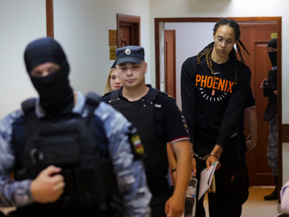 WNBA star and two-time Olympic gold medalist Brittney Griner is escorted to a courtroom for a hearing, in Khimki just outside Moscow, Russia, Wednesday, July 27, 2022. American basketball star Brittney Griner returned Wednesday to a Russian courtroom for her drawn-out trial on drug charges that could bring her 10 …