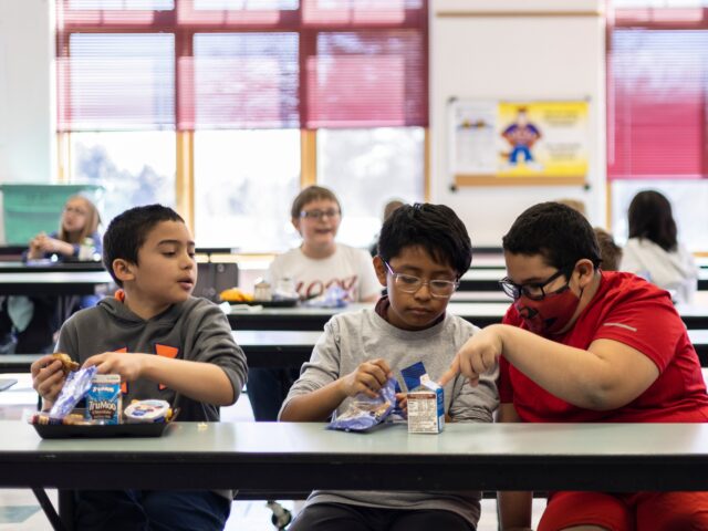 MONUMENT, CO - Feb. 28: Students eat lunch at Palmer Lake Elementary School on Monday, Feb. 28, 2022 in Monument, CO. Lewis Palmer School District followed the El Paso County Departments orders following COVID protocols, which led to them returning classes to normal far earlier than other school districts. (Chet …