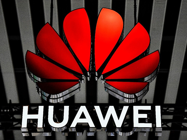 The Huawei logo is display during CES 2018 at the Las Vegas Convention Center on January 9, 2018 in Las Vegas, Nevada. CES, the world's largest annual consumer technology trade show, runs through January 12 and features about 3,900 exhibitors showing off their latest products and services to more than …