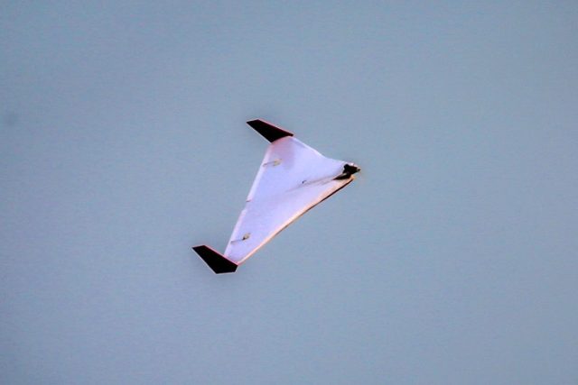 An Iranian unmanned aerial vehicle (UAV) or drone flies during Iranian military exercises