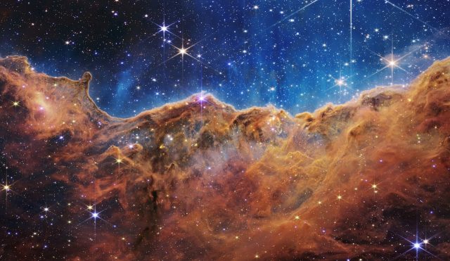 This image from the James Webb Space Telescope shows “mountains” and “valleys” spe