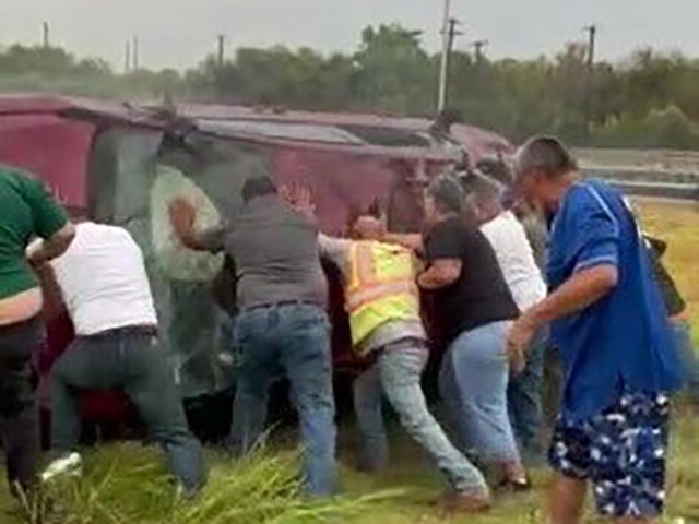 WATCH – Citizens Flip Car to Rescue Trapped Driver: ‘People Here Just Care’