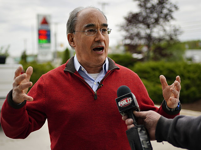 CORRECTS CITY TO BANGOR NOT HERMON Bruce Poliquin, Republican candidate for Maine's 2nd Congressional District, speaks to reporters during a campaign stop at Dysart's Restaurant and Truck Stop, Thursday, May 19, 2022, in Bangor, Maine. (AP Photo/Robert F. Bukaty)