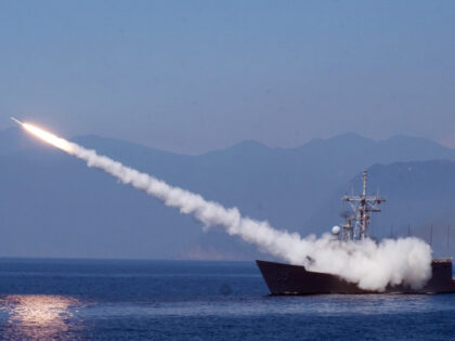 FILE - A Cheng Kung class frigate fires an anti air missile as part of a navy demonstratio