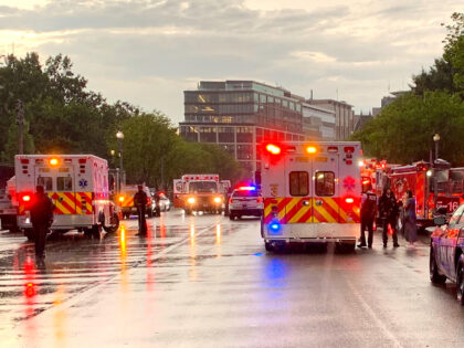 In this photo provided by @dcfireems, emergency medical crews are staged on Pennsylvania A