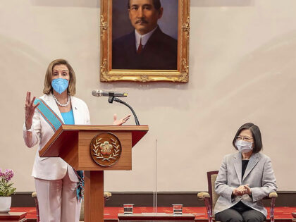 FILE - In this photo released by the Taiwan Presidential Office, U.S. House Speaker Nancy Pelosi speaks during a meeting with Taiwanese President President Tsai Ing-wen, second from right, in Taipei, Taiwan, Wednesday, Aug. 3, 2022. China is staging live-fire military drills in six self-declared zones surrounding Taiwan in response …