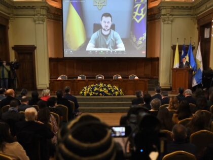 TOPSHOT - Ukraine's President Volodymyr Zelensky speaks during a videoconference held at the Universidad Catolica in Santiago, on August 17, 2022. (MARTIN BERNETTI/AFP via Getty Images)