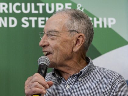 Former Sen. Blanche Lincoln, D-Ark., left, listens as Sen. Chuck Grassley, R-Iowa, talks at the Iowa Department of Agriculture and Land Stewardship booth at the Iowa State Fair on Friday, August 9, 2019. (Caroline Brehman/CQ Roll Call)