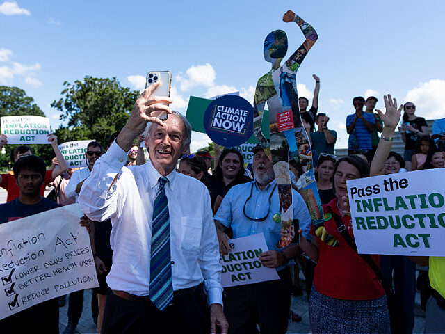 UNITED STATES - AUGUST 7: Sen. Ed Markey, D-Mass., shoots a selfie video with climate activists at the Senate steps after the Senate passed the Inflation Reduction Act in the Capitol on Sunday, August 7, 2022. (Bill Clark/CQ-Roll Call, Inc via Getty Images)