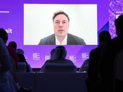 Elon Musk, chief executive officer of Tesla Inc., speaks via video link during the Qatar Economic Forum in Doha, Qatar, on Tuesday, June 21, 2022. The second annual Qatar Economic Forum convenes global business leaders and heads of state to tackle some of the world's most pressing challenges, through the …
