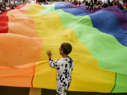 People attend the Equality March in Krakow, Poland on May, 19 2018. LGBT people and their