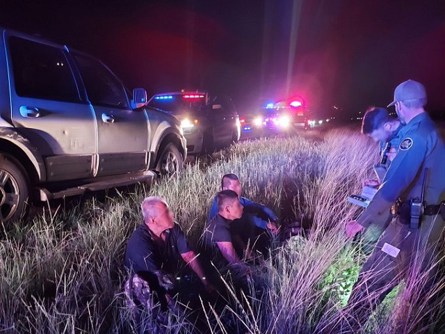 Brian Terry Station Border Patrol agents arrest a human smuggler and migrants during a traffic stop in Arizona. (U.S. Border Patrol/Tucson Sector)