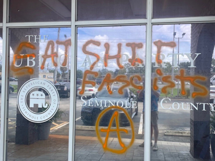 A Republican Party campaign office in Seminole County, Florida, was vandalized over the weekend with spray paint words that read “Eat S**t Fascists” and featured an anarchist symbol.