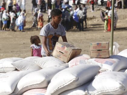 MEKELLE, ETHIOPIA - MARCH 08: Tigray people, fled due to conflicts and taking shelter in Mekelle city of the Tigray region, in northern Ethiopia, receive the food aid distributed by United States Agency for International Development (USAID) on March 8, 2021. (Minasse Wondimu Hailu/Anadolu Agency via Getty Images)