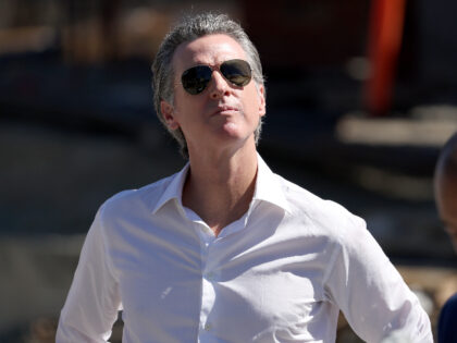 California Gov. Gavin Newsom looks on during a visit the Antioch Water Treatment Plant on