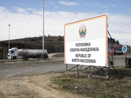 A new sign reading "Republic of Macedonia" sits by the road at the Greece-Macedo