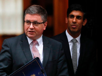 Britain's Justice Secretary and Lord Chancellor Robert Buckland (L) and Britain's Chief Secretary to the Treasury Rishi Sunak leave from 10 Downing Street, central London on October 24, 2019, after attending a political Cabinet meeting. - The pound firmed against the dollar and euro on Wednesday as the European Union …