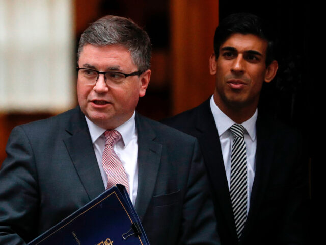 Britain's Justice Secretary and Lord Chancellor Robert Buckland (L) and Britain's Chief Se