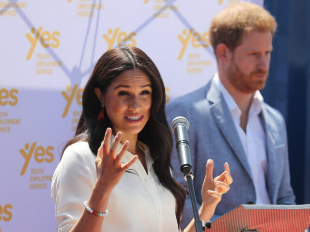 JOHANNESBURG, SOUTH AFRICA - OCTOBER 02: Meghan, Duchess of Sussex speaks as Prince Harry,