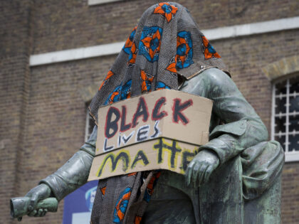 Hours before it was removed by the Canal and River Trust, the statue of merchant slave own