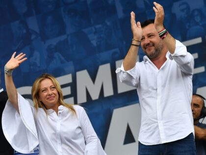Head of the League party Matteo Salvini (R) and head of the Brothers of Italy (FdI) party, Giorgia Meloni acknowledge applause on stage at the end of a united rally for a protest against the government on July 4, 2020 on Piazza del Popolo in Rome, as the country eases …