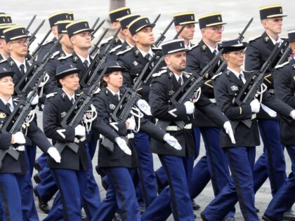 French national Gendarme hold the FAMAS assault rifles as they take part in the annual Bastille Day military ceremony on the Place de la Concorde in Paris, on July 14, 2020. - France holds a reduced version of its traditional Bastille Day parade this year due to safety measures over …