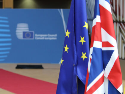 Flags of the European Union EU and the United Kingdom UK / Great Britain among all the other European flags in Forum Europa Building in Brussels, Belgium, during the European Council summit - special meeting of EU Leaders about Article 50 and the departure of United Kingdom from EU, Brexit …