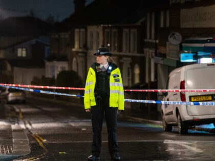 Police attend the scene of a stabbing on London Road, near the junction of Oakfield Road, in Croydon, London. Officers were called to five reports of stabbings in the Croydon area between 6.56pm and 9.12pm on Friday February 5, Metropolitan Police said. Picture date: Saturday February 6, 2021. PA Photo …