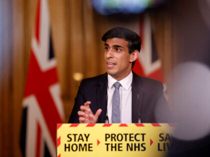 Britain's Chancellor of the Exchequer Rishi Sunak attends a virtual press conference inside 10 Downing Street in central London on March 3, 2021, following his earlier Budget. - Britain on Wednesday sharply cut the growth forecast of its coronavirus-ravaged economy, warning the pandemic was still causing "profound damage" in an …