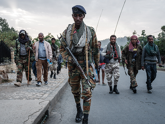 Tigray People's Liberation Front (TPLF) fighters arrive after eight hours of walking in Me