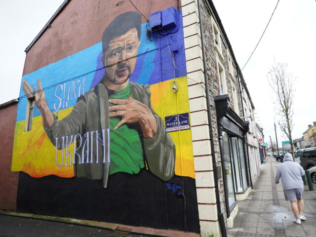People pass a mural of President of Ukraine Volodymyr Zelenskyy, by the artist Phil Atkinson in Granard, County Longford, Ireland. Picture date: Tuesday April 5, 2022. (Photo by Niall Carson/PA Images via Getty Images)