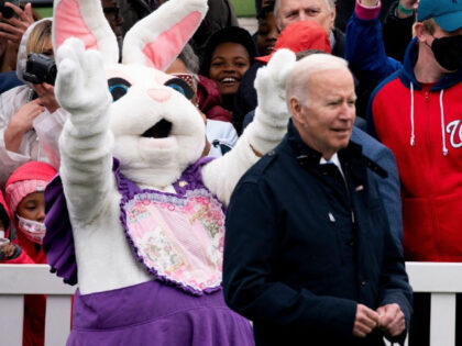 The Easter Bunny gestures to President Joe Biden during the annual Easter egg roll on the