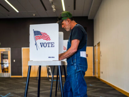 AMES, IA - JUNE 07: A voter fills out a ballot at the Ames Public Library on primary Election Day on June 7, 2022 in Ames, Iowa. Iowa is one of seven states holding primaries today. (Photo by Stephen Maturen/Getty Images)