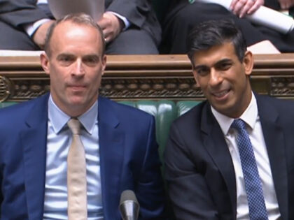 Deputy Prime Minister Dominic Raab and Chancellor of the Exchequer Rishi Sunak listen as D