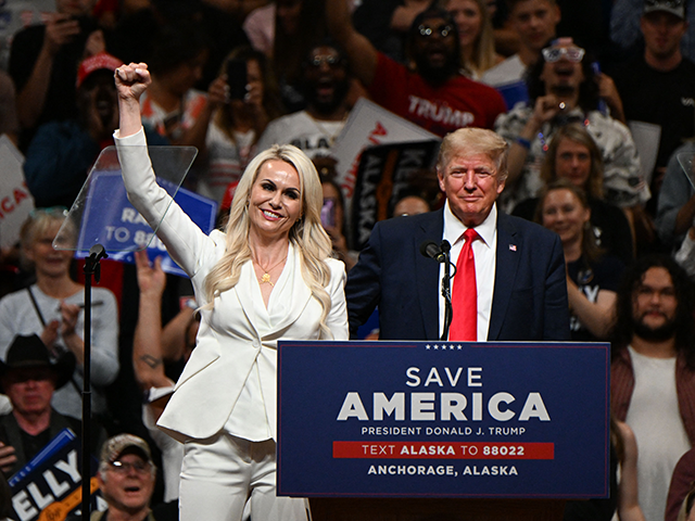 ANCHORAGE, ALASKA - JULY 09: Republican U.S. Senate candidate Kelly Tshibaka (L) pumps her fist as former U.S. President Donald Trump (R) looks on during a "Save America" rally at Alaska Airlines Center on July 09, 2022 in Anchorage, Alaska. Former President Donald Trump held a "Save America" rally in Anchorage where he campaigned with U.S. House candidate former Alaska Gov. Sarah Palin and U.S. Senate candidate Kelly Tshibaka. (Photo by Justin Sullivan/Getty Images)