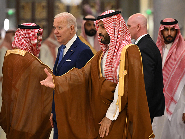 US President Joe Biden (C-L) and Saudi Crown Prince Mohammed bin Salman (C) arrive for the