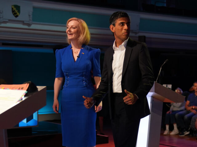 HANLEY, ENGLAND - JULY 25: Rishi Sunak and Liz Truss take part in the BBC Leadership debate at Victoria Hall on July 25, 2022 in Hanley, England. Former Chancellor Rishi Sunak and Current Foreign Secretary Liz Truss go head-to-head in the BBC Conservative Leadership debate in their bid to win …