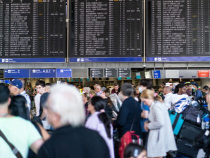Flight information boards display cancelled flights in the departures hall at Terminal 1 of Frankfurt Airport in Frankfurt, Germany, on Wednesday, July 27, 2022. Deutsche Lufthansa AG passengers in Frankfurt and Munich face an almost complete shutdown of operations on Wednesday as a walkout by ground crew forces Europes largest …
