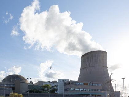 27 July 2022, Lower Saxony, Lingen: View of the Emsland nuclear power plant (KKE) with its cooling tower. (to dpa "Nuclear power plant fuel rods: from uranium to delivery time") Photo: Friso Gentsch/dpa (Photo by Friso Gentsch/picture alliance via Getty Images)