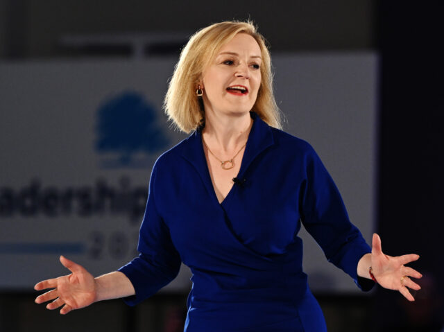 CARDIFF, WALES - AUGUST 03: UK Foreign Secretary Liz Truss speaks during a Conservative party membership hustings at the All Nations Centre on August 3, 2022 in Cardiff, Wales. Rishi Sunak and Liz Truss are holding hustings around the UK for Conservative party members as they vie to become their …