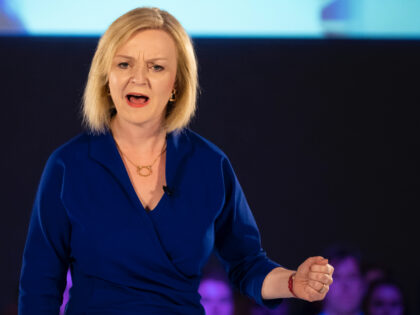 CARDIFF, WALES - AUGUST 03: UK Foreign Secretary Liz Truss clenches her fist during a Cons