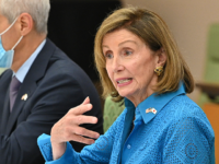 House Speaker Nancy Pelosi (R) gestures during talks with Hiroyuki Hosoda (not pictured), speaker of Japans House of Representatives, during a meeting in Tokyo on August 5, 2022, as US Ambassador to Japan Rahm Emanuel (L) listens. - Pelosi early said on August 5 that the United States will "not allow" China to isolate Taiwan, after her visit to the self-ruled island infuriated Beijing. (Photo by Kazuhiro NOGI / AFP) (Photo by KAZUHIRO NOGI/Afp/AFP via Getty Images)