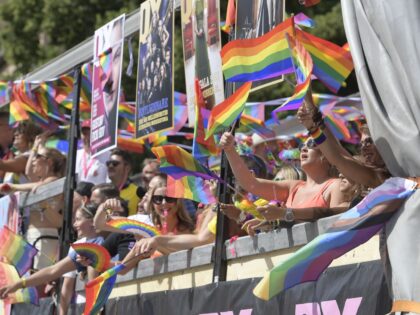 People take part in this year's Pride Parade in Stockholm on August 6, 2022. - Sweden OUT (Photo by Maja SUSLIN / TT NEWS AGENCY / AFP) / Sweden OUT (Photo by MAJA SUSLIN/TT NEWS AGENCY/AFP via Getty Images)